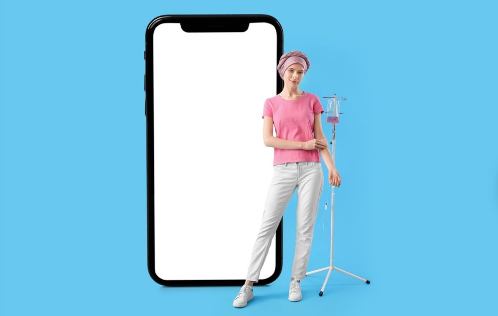 Woman with IV drip beside a large smartphone with a blank screen on a blue background.