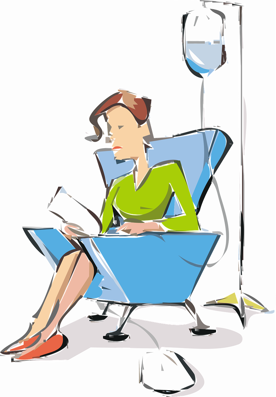 Woman in blue chair receiving IV fluids, reading a book.