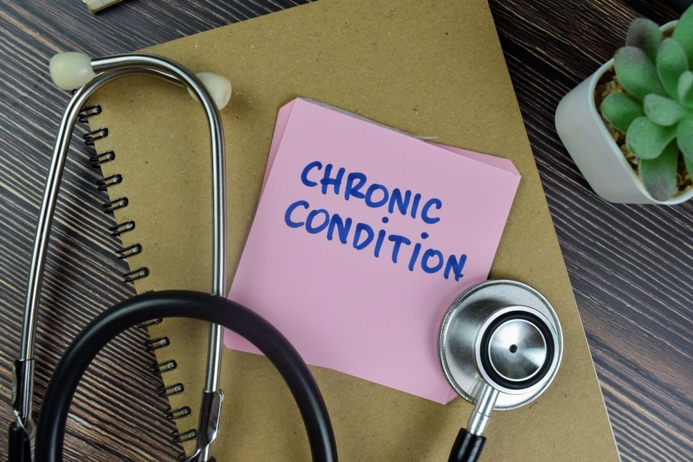 Stethoscope, notepad with
