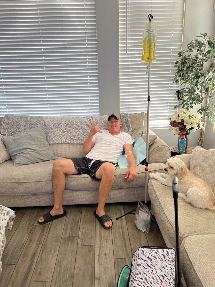 Client receiving mobile IV therapy from AZ IV Medics at home in Arizona